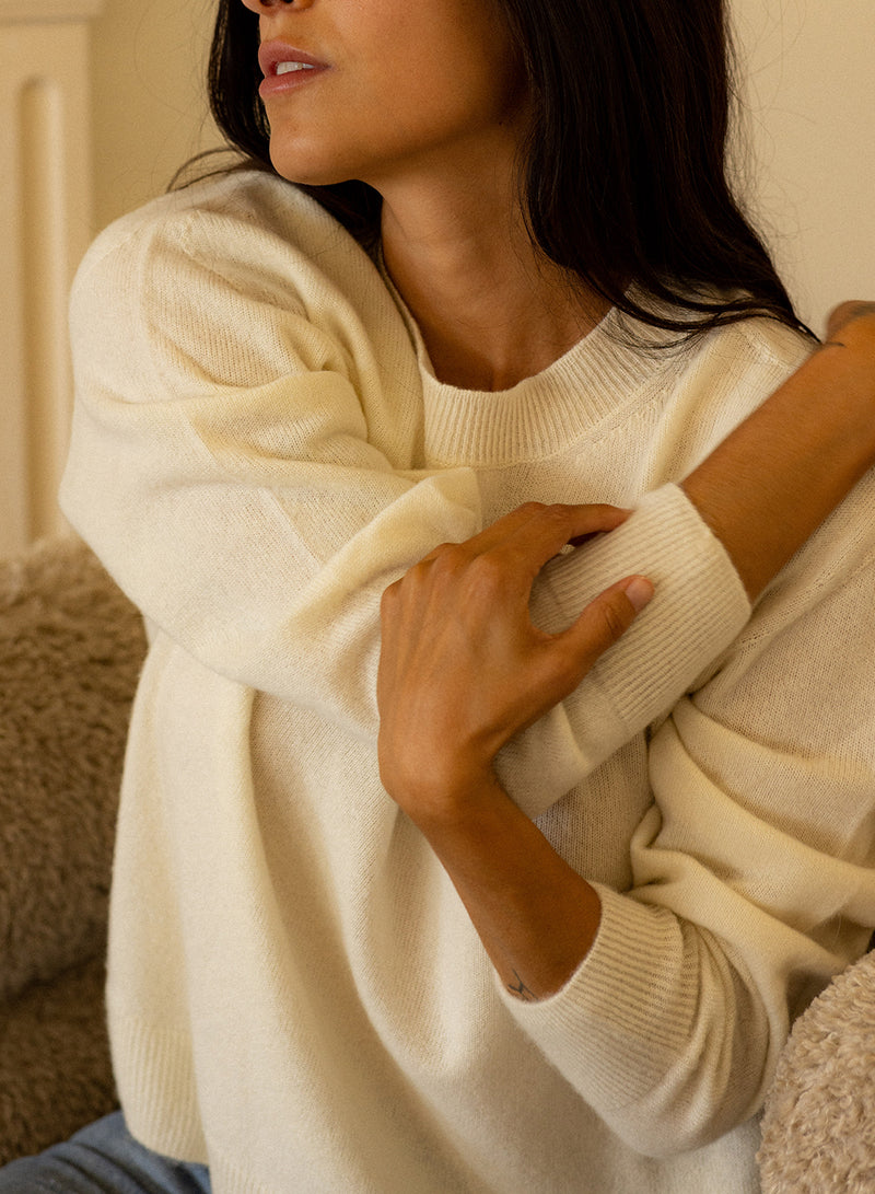 Stateside Brushed Cashmere Crew Sweater in Cream - arms crossed