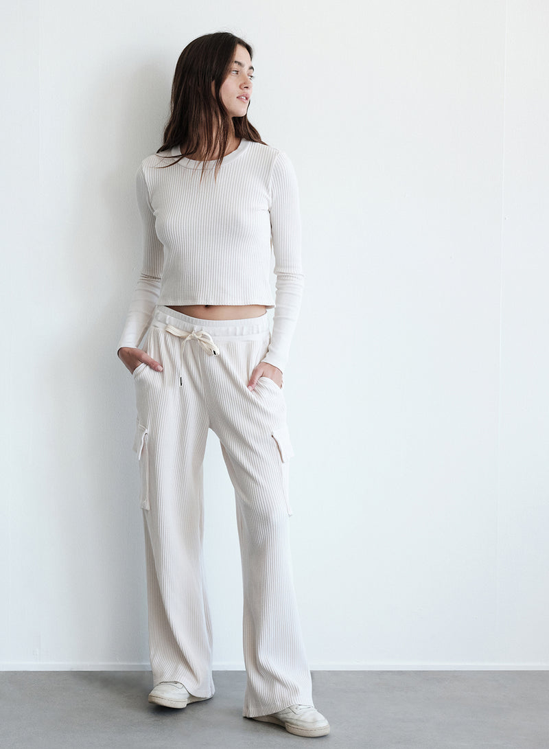 Luxe Thermal Drawstring Cargo Pant in Cream-full length ( model looking away)