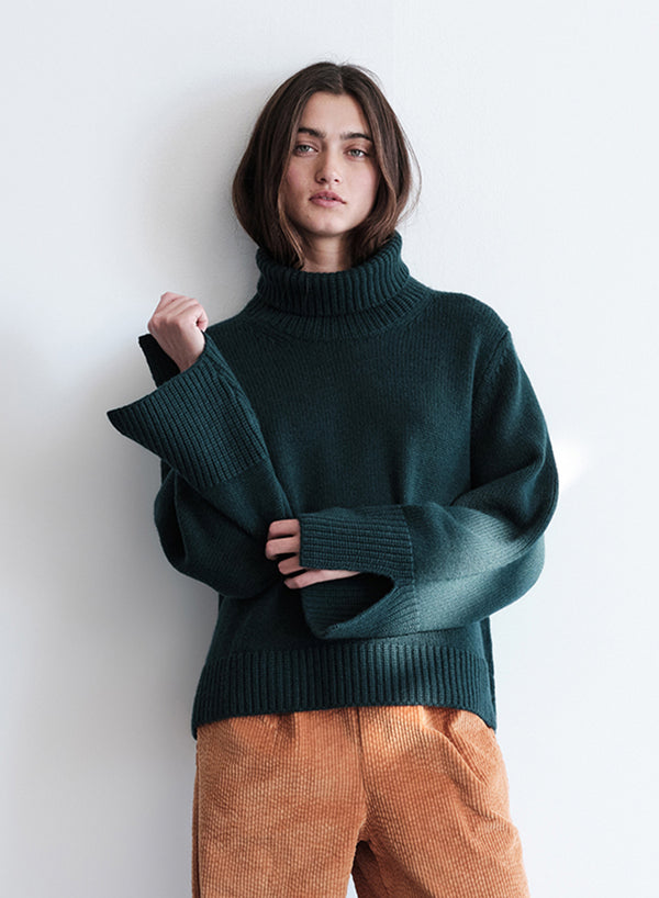 Cozy Cashmere Blend Turtleneck Sweater in Rainforest hands at front