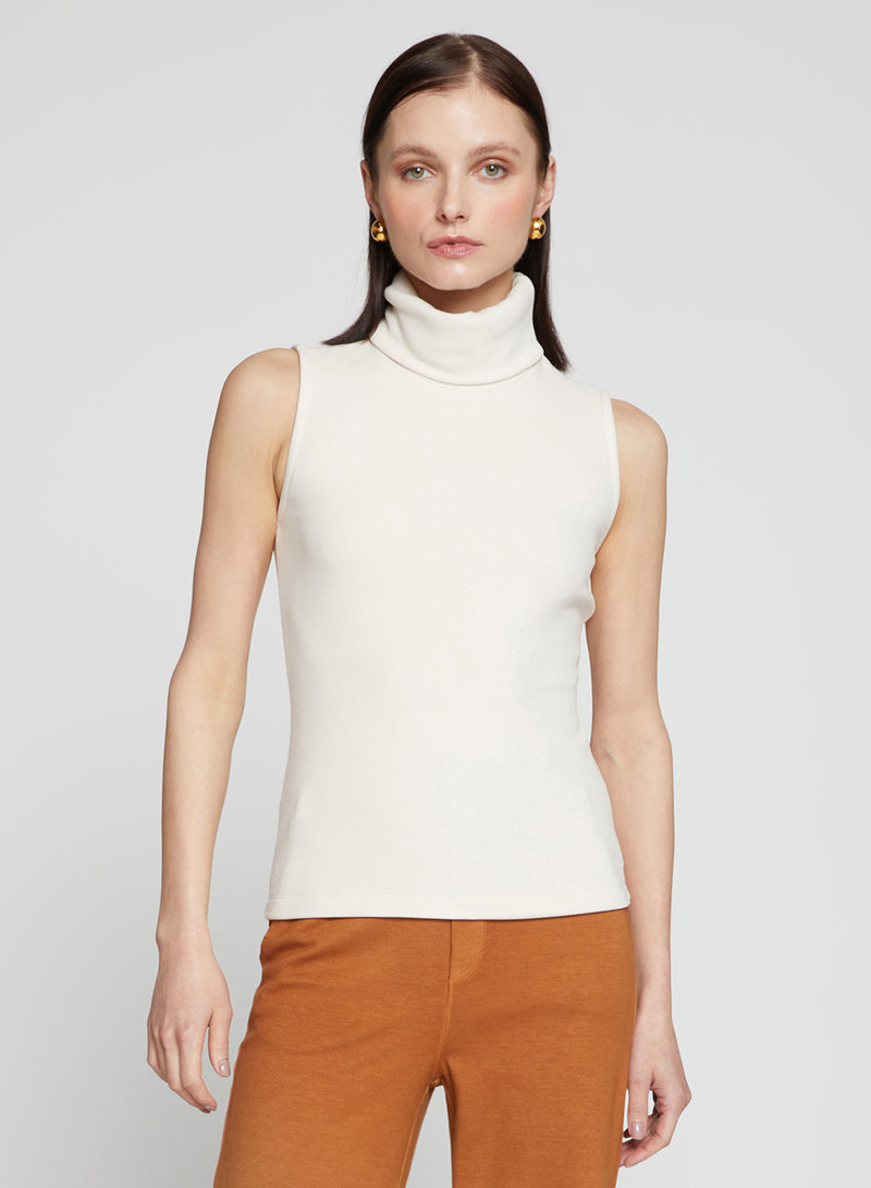 Honeyluxe Flat Back Rib Sleeveless Turtleneck in Cream-3/4 front view