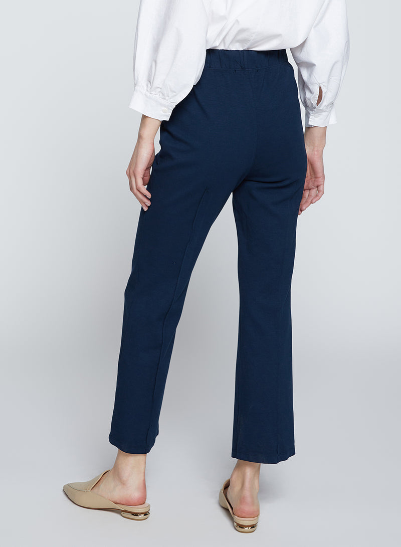 Ponte Cropped Kick Flare Pant in New Navy-back view close up 