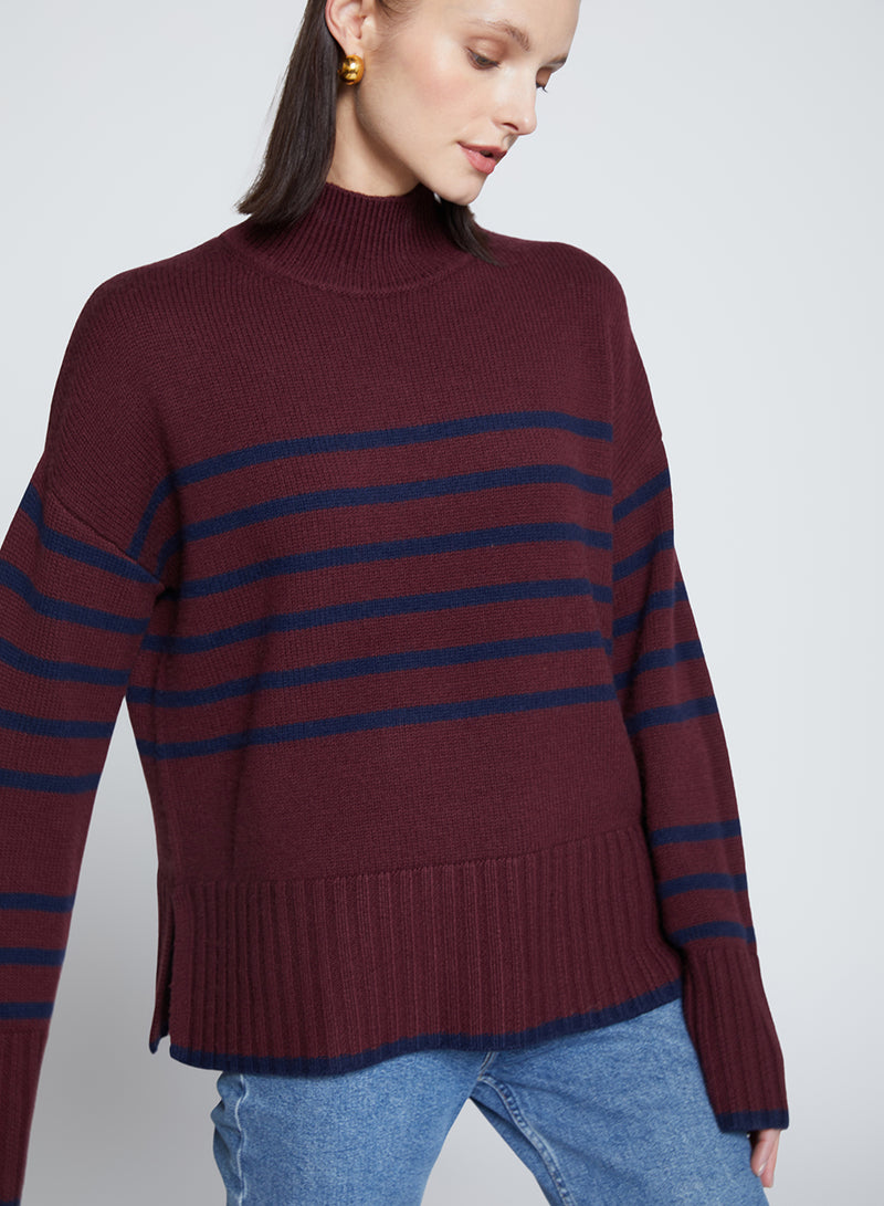 Striped Mock Neck Sweater in Cherry Liquor-close up model looking down 