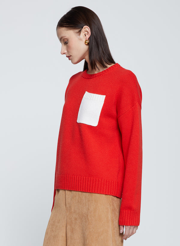 Colorblock Pocket Crew Sweater in Sumo-model is looking down 