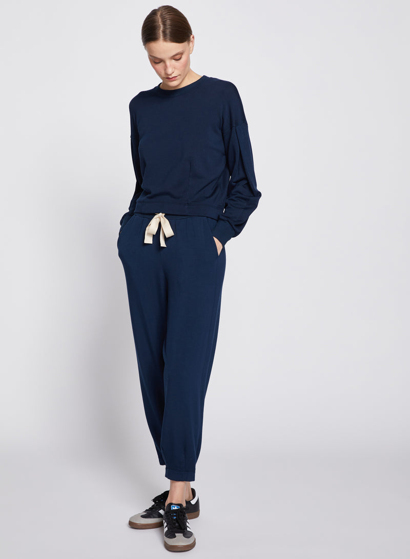 Softest Fleece Cropped Pullover in New Navy-full view  model is looking down