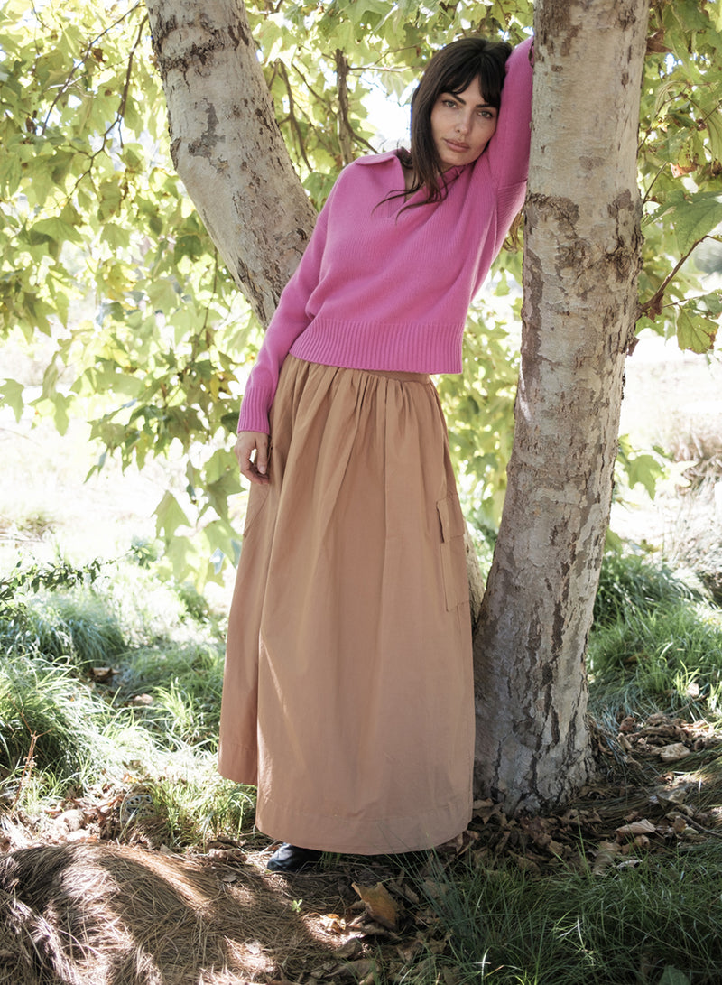Cozy Cashmere Blend Johnny Collar Sweater in Electric Pink leaning on tree