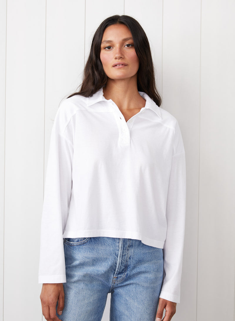 Cloud Jersey Johnny Collar Tee in White - front view with the girl wearing jeans