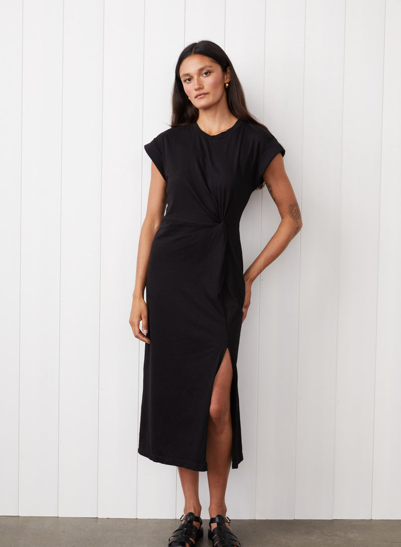 Cloud Jersey Twist Midi Dress in Black - front view with the slit shown