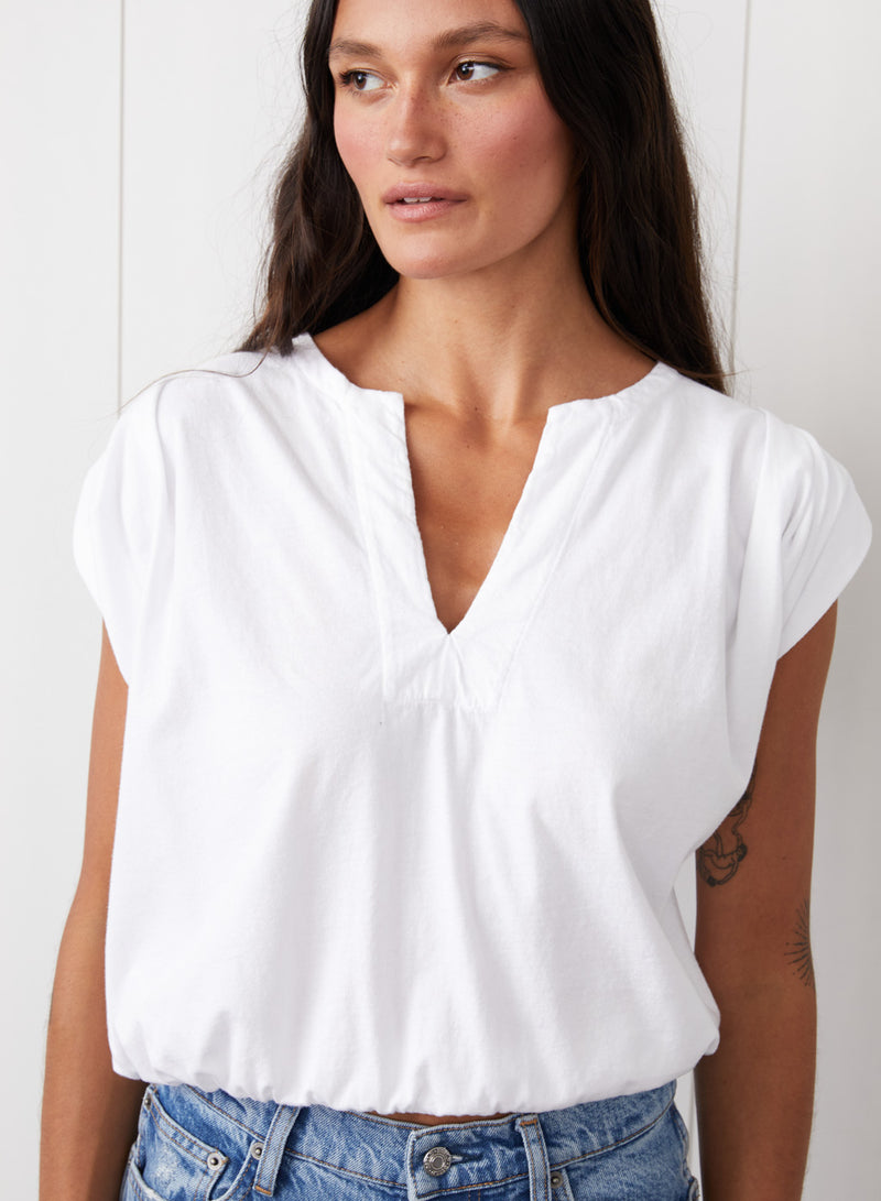 Cloud Jersey Deep V Muscle Top in White - front close up view