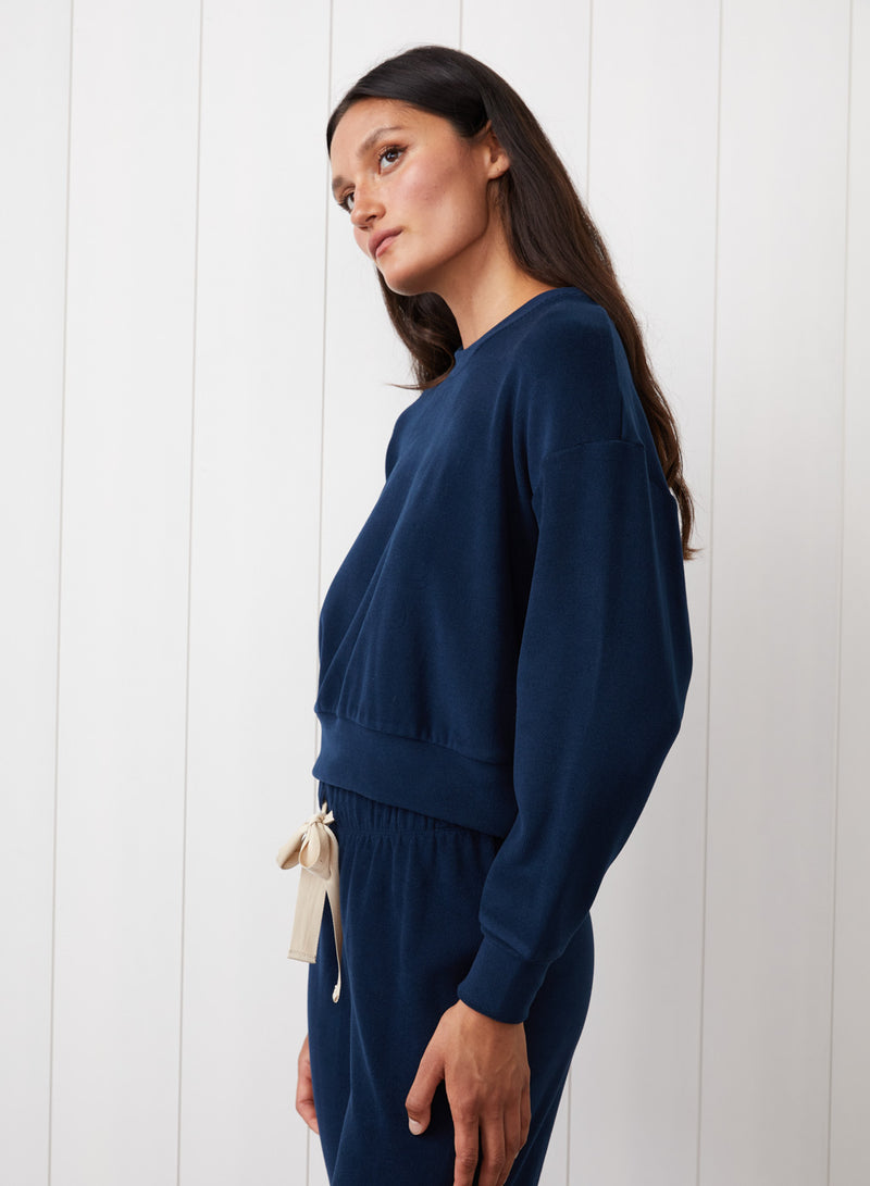 Honeyluxe Tie Hem Pullover in New Navy - side view