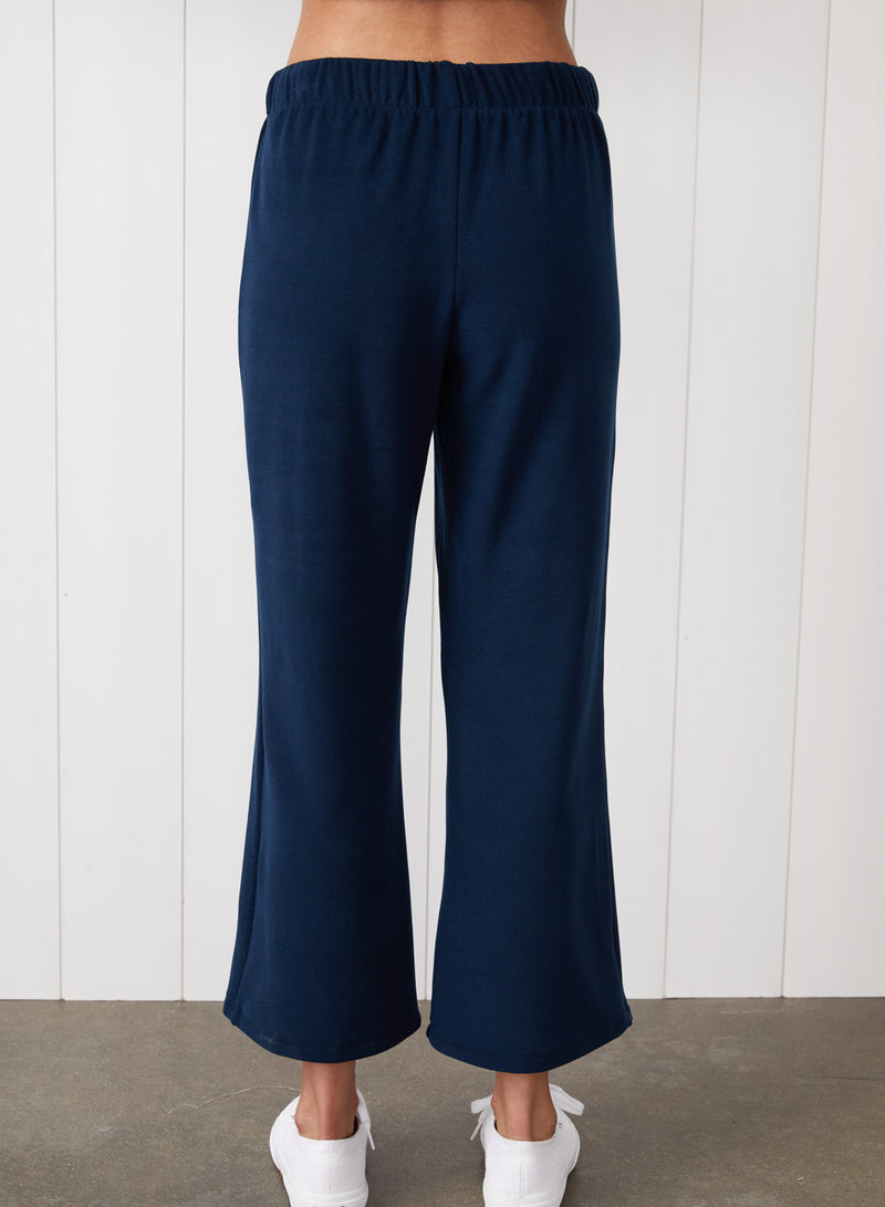 Honeyluxe Drawstring Cropped Flare Pant in New Navy - back view