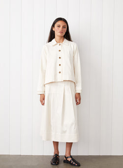 Cava Twill Peacoat in Cream - front view with full body image. The girl is just standing. 