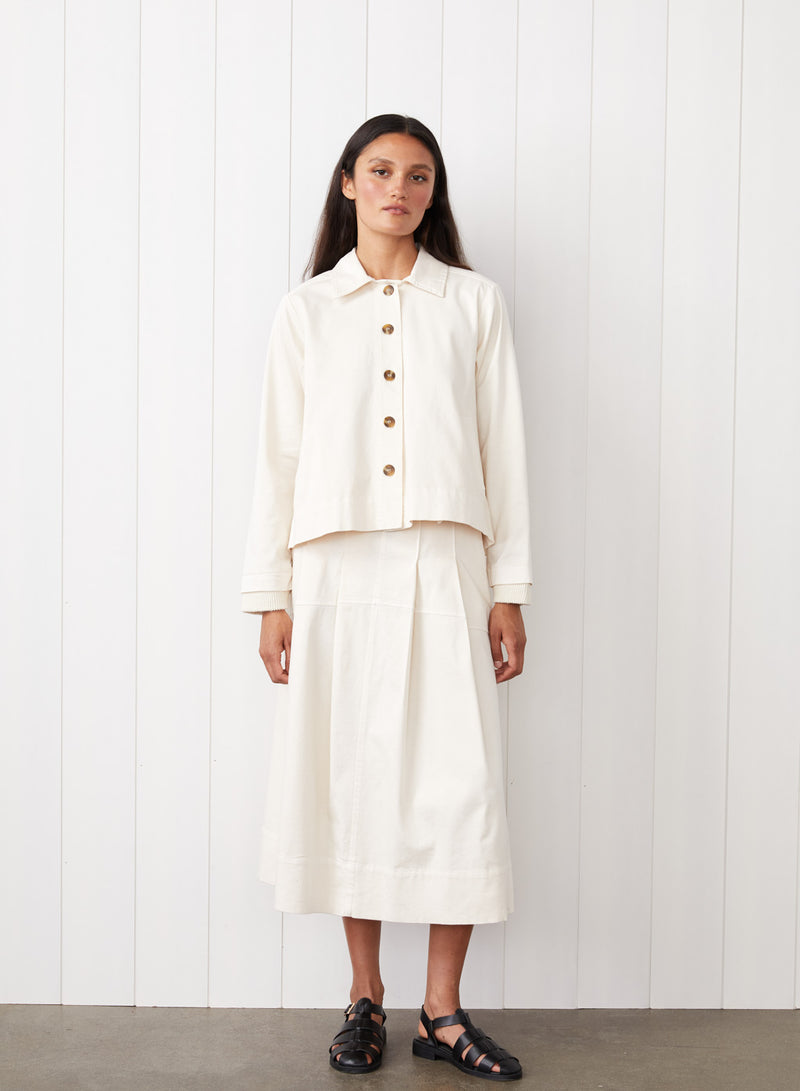 Cava Twill Peacoat in Cream - front view with full body image. The girl is just standing. 