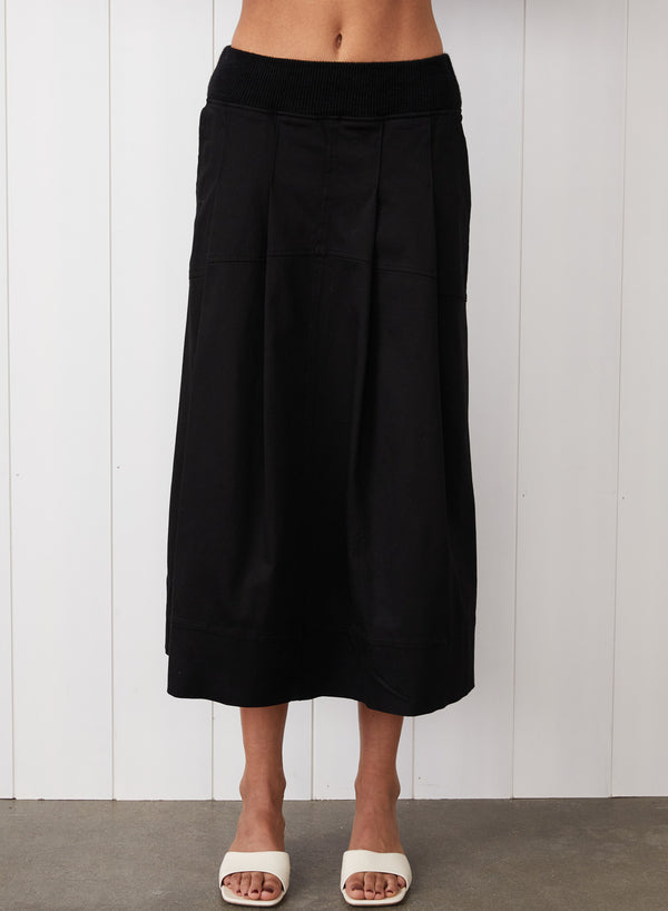 Cava Twill Skirt in Black - front view with the elastic waist