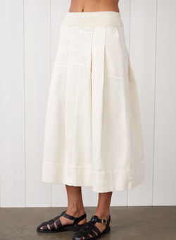 Cava Twill Skirt in Cream - front view with the skirt long 