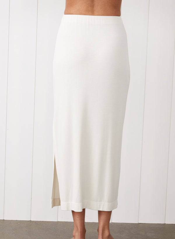 2x1 Fine Rib Side Slit Midi Skirt in White - back view with the view of slit