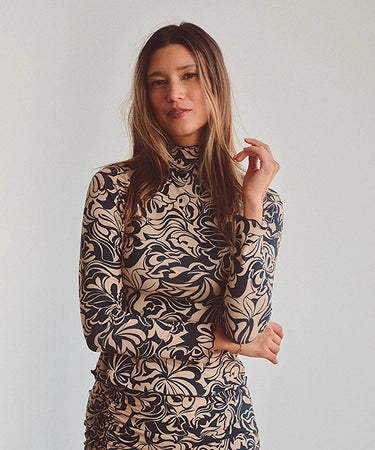 woman relaxing on lounge in dress