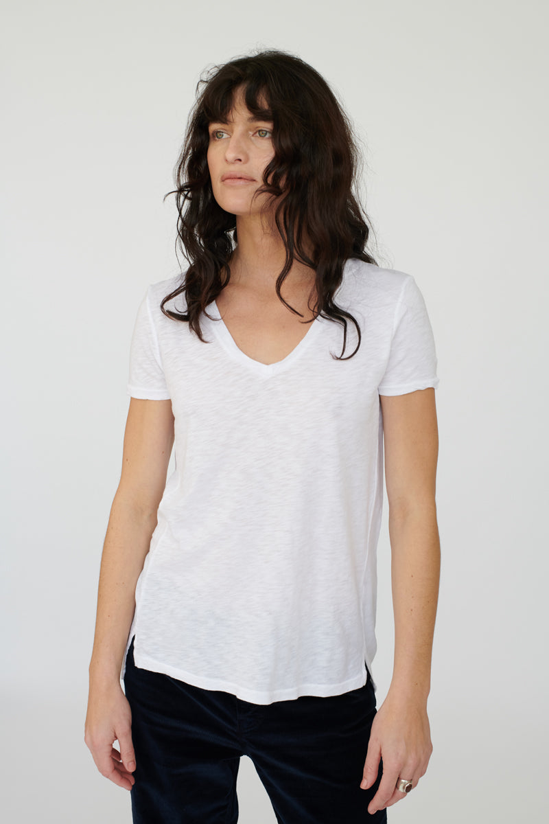 white supima s/s v-neck tee - front paired with black jeans