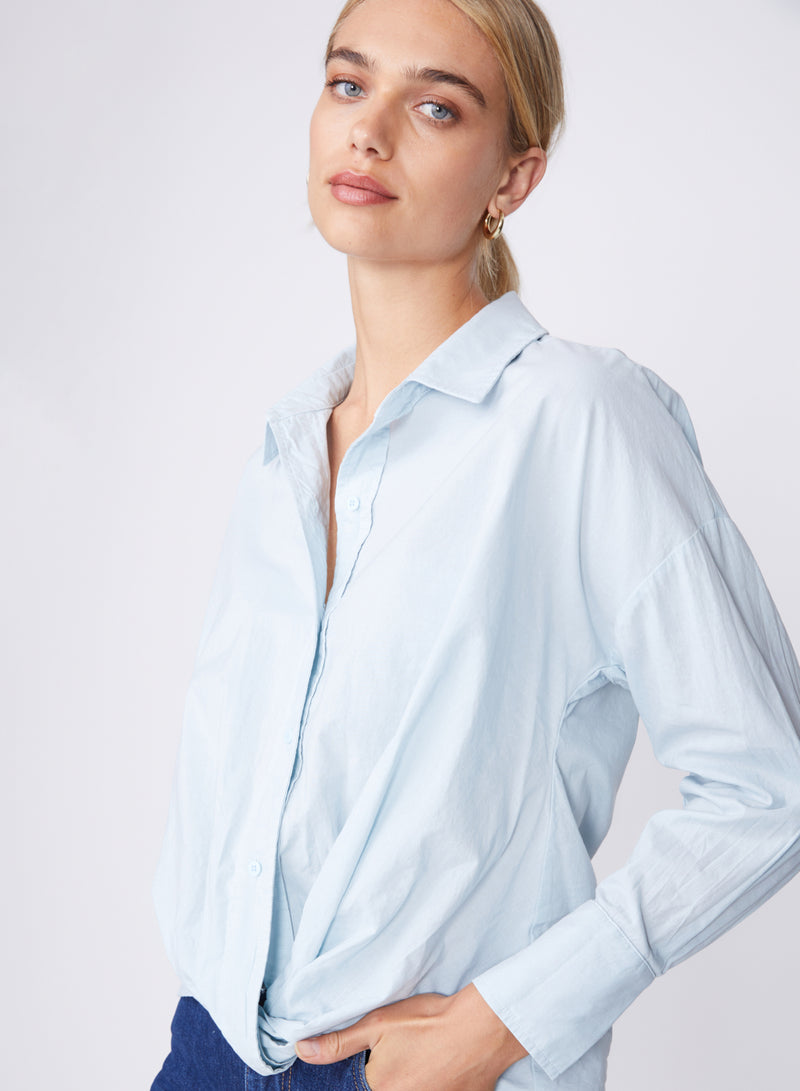 light blue twist front poplin shirt