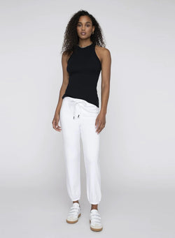 black rib high neck tank - front paired with white sweatpant