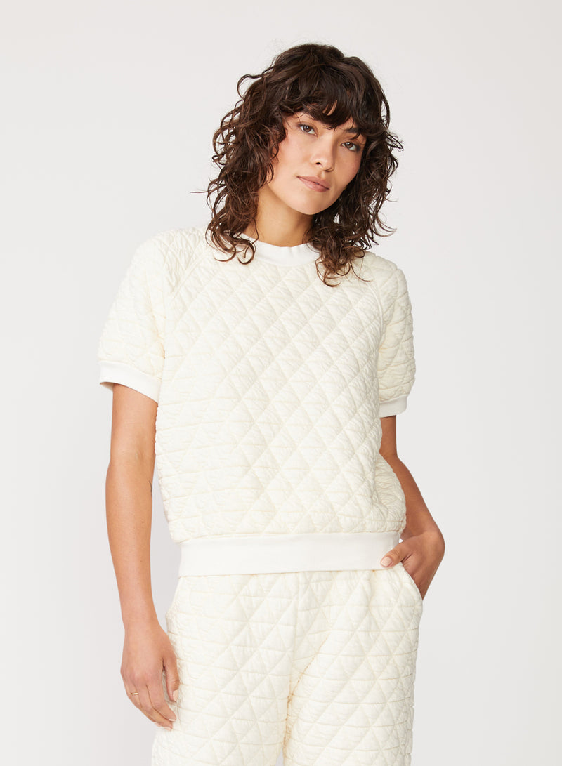 cream quilted knit top