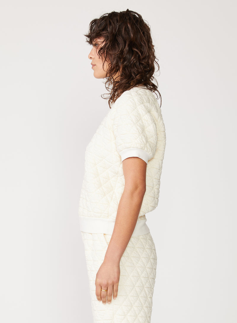 cream quilted knit top