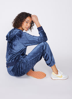 blue bamboo velour sweatpant - sitting at side