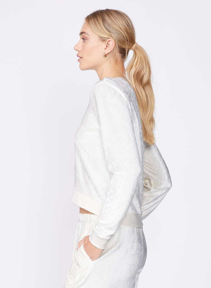 cream bamboo velour cropped top - side view of high low hem