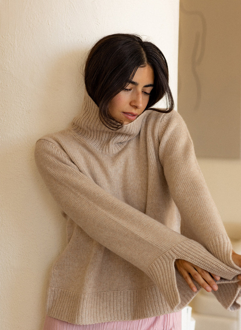 Stateside Cozy Cashmere Turtleneck Sweater in Camel - arms extended
