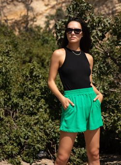 black cropped ribbed tank - front paired with green shorts