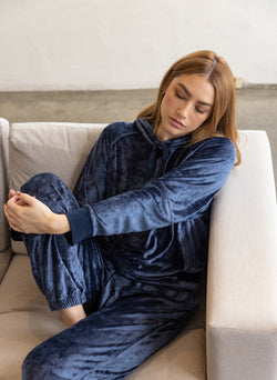 Stateside Bamboo Velour Hoodie in New Navy - front sitting with knee up